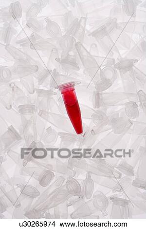 Picture - One of test tubes with blue liquid, high angle view, Full Frame . Fotosearch