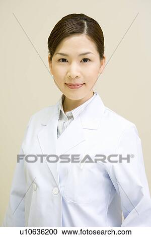 Portrait of a young scientist woman, front view View Large Photo Image Stock Image - Portrait of a young scientist woman, front view. Fotosearch