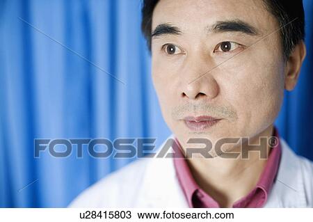 Close-up of a male doctor View Large Photo Image Stock Image - Close-up of a male doctor. Fotosearch