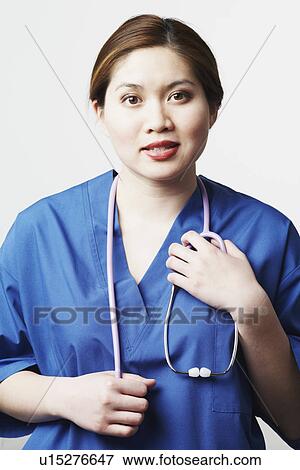 Portrait of a female doctor View Large Photo Image Stock Photo - Portrait of a female doctor. Fotosearch