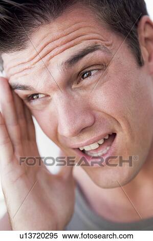 Head shot of man scowling View Large Photo Image Stock Photography - Head shot of man scowling. Fotosearch