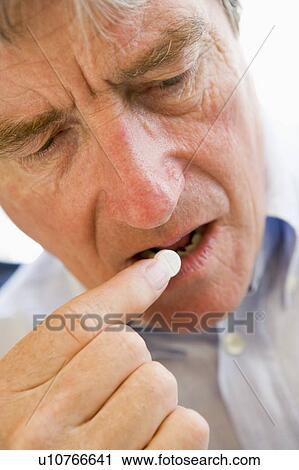 Man Taking Pills View Large Photo Image Stock Image - Man Taking Pills. Fotosearch