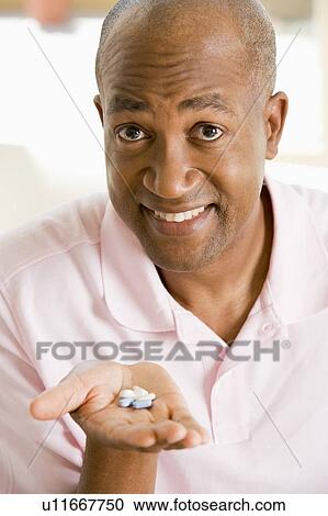 Man Taking Pills View Large Photo Image Stock Image - Man Taking Pills. Fotosearch