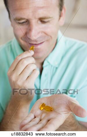 Man Taking Pills View Large Photo Image Stock Image - Man Taking Pills. Fotosearch