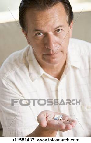 Man Taking Pills View Large Photo Image Stock Photo - Man Taking Pills. Fotosearch