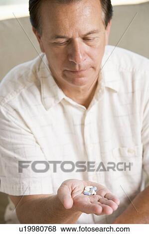 Man Taking Pills View Large Photo Image Stock Photo - Man Taking Pills. Fotosearch