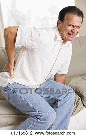 Stock Image - Man With Back Pain. Fotosearch