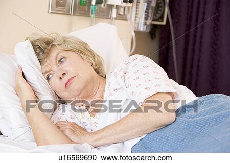 Senior Woman Lying In Hospital Bed View Large Photo Image Stock Image - Senior Woman Lying In Hospital Bed. Fotosearch