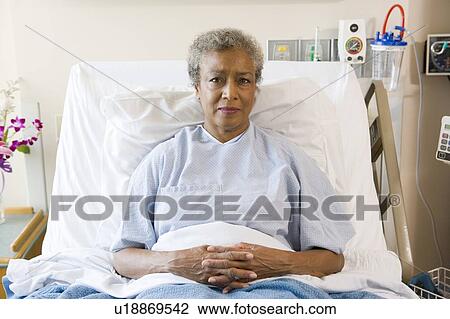 Senior Woman Sitting In Hospital Bed View Large Photo Image Stock Image - Senior Woman Sitting In Hospital Bed. Fotosearch