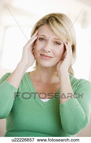 Woman With A Headache View Large Photo Image Stock Photo - Woman With A Headache. Fotosearch