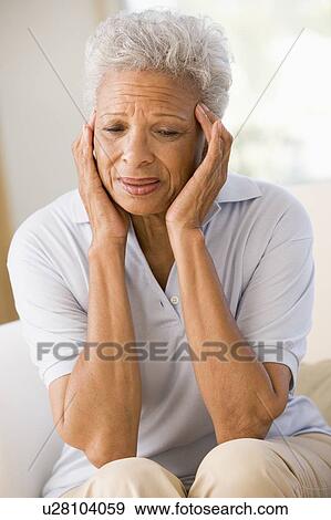 Woman With A Headache View Large Photo Image Stock Photo - Woman With A Headache. Fotosearch