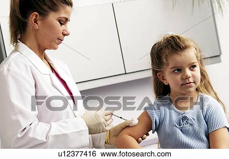 Girl getting a shot View Large Photo Image Stock Photograph - Girl getting a shot. Fotosearch