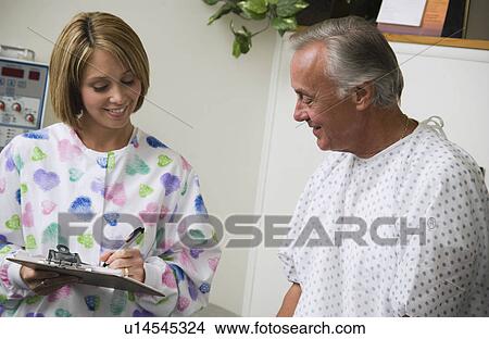Nurse and patient View Large Photo Image Picture - Nurse and patient. Fotosearch