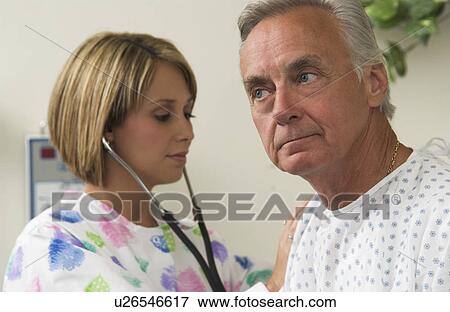 Nurse and patient View Large Photo Image Stock Photo - Nurse and patient. Fotosearch