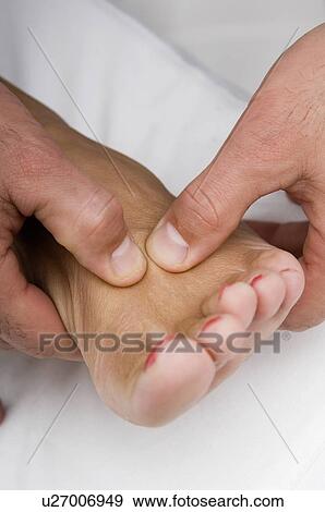 Woman getting foot massage View Large Photo Image Stock Photo - Woman getting foot massage. Fotosearch