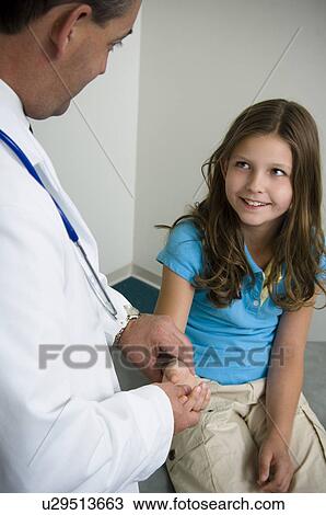 Stock Image - Girl getting physical. Fotosearch
