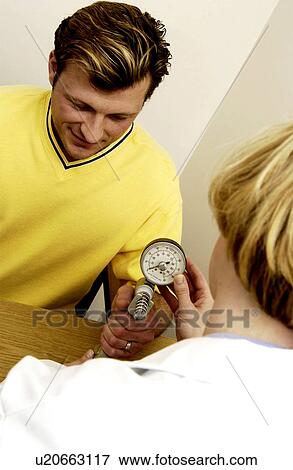Man having physical therapy View Large Photo Image Stock Photo - Man having physical therapy. Fotosearch