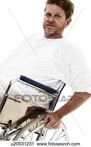 Stock Image - Senior man in wheelchair. Fotosearch