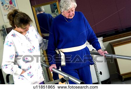 Stock Photography - Woman in physical rehabilitation. Fotosearch