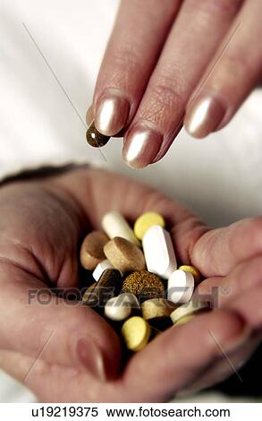 Woman taking pills View Large Photo Image Stock Photography - Woman taking pills. Fotosearch