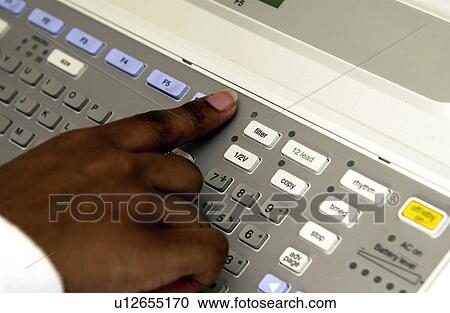African American technician monitoring EKG machine View Large Photo Image Stock Image - African American technician monitoring EKG machine. Fotosearch