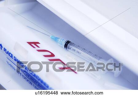 Disposal of syringe View Large Photo Image Stock Photo - Disposal of syringe. Fotosearch