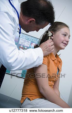 Girl getting physical View Large Photo Image Stock Photo - Girl getting physical. Fotosearch
