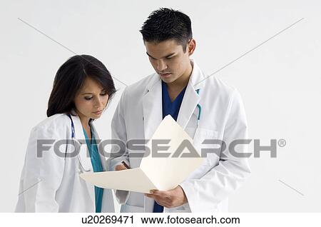 Stock Image - Portrait of doctors. Fotosearch