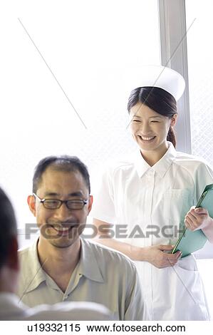 Doctor talking to patient View Large Photo Image Stock Photography - Doctor talking to patient. Fotosearch