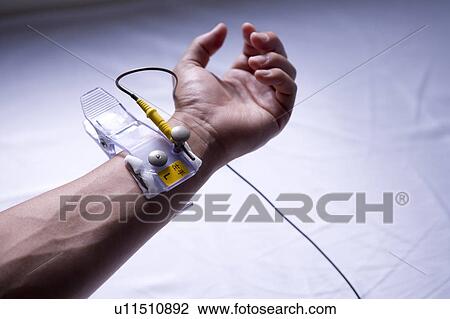 Man's hand connected to cardiac monitor View Large Photo Image Stock Image - Man's hand connected to cardiac monitor. Fotosearch
