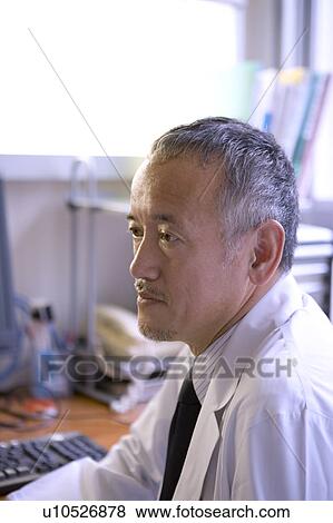 Stock Photo - Portrait of a doctor. Fotosearch