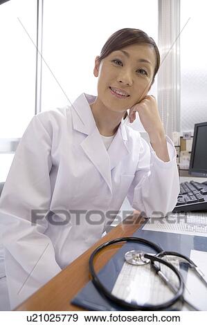 Stock Photo - Portrait of a female doctor. Fotosearch