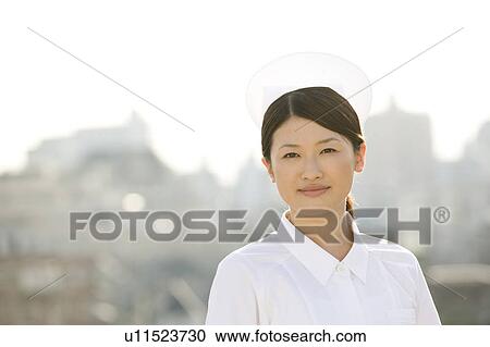 Portrait of a female nurse View Large Photo Image Stock Image - Portrait of a female nurse. Fotosearch