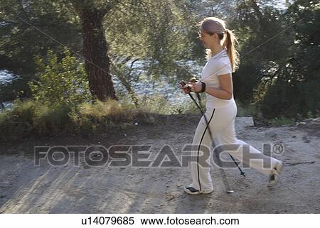 Stock Photography - Female Nordic walker. Fotosearch