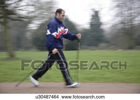 Male Nordic walker View Large Photo Image Picture - Male Nordic walker. Fotosearch