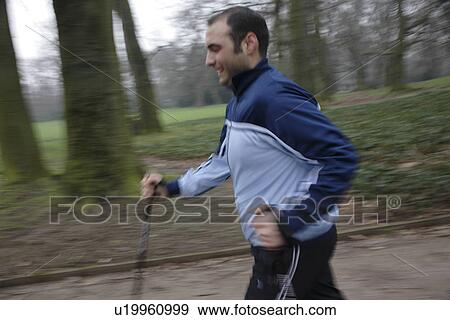 Stock Photo - Male Nordic Walker. Fotosearch