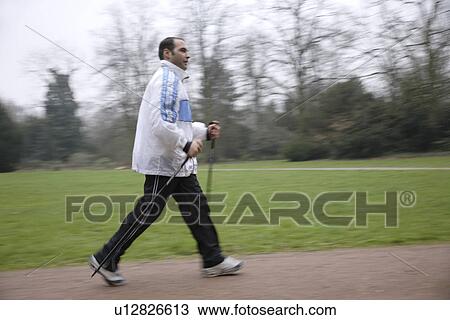 Male Nordic walker View Large Photo Image Stock Image - Male Nordic walker. Fotosearch