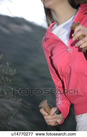 Stock Photo - Female Nordic walker. Fotosearch