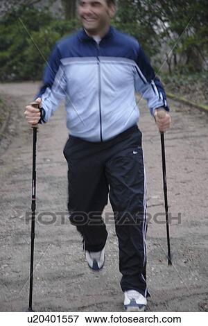 Stock Photo - Male Nordic Walker. Fotosearch