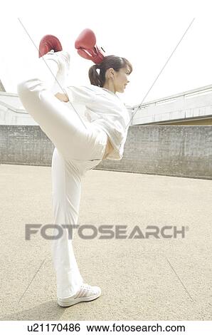 Woman who does stretching View Large Photo Image Stock Photograph - Woman who does stretching. Fotosearch