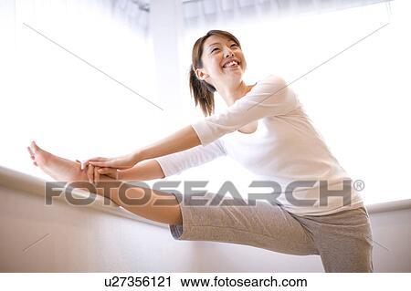 Woman who has gymnastic exercise in morning View Large Photo Image Stock Image - Woman who has gymnastic exercise in morning. Fotosearch