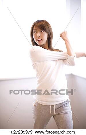 Woman who has gymnastic exercise in morning View Large Photo Image Stock Photo - Woman who has gymnastic exercise in morning. Fotosearch