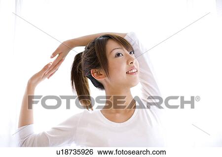 Woman who has gymnastic exercise in morning View Large Photo Image Stock Photograph - Woman who has gymnastic exercise in morning. Fotosearch