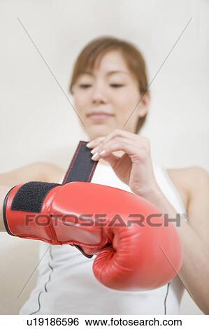 Woman who does a boxing-exercise View Large Photo Image Stock Photograph - Woman who does a boxing-exercise. Fotosearch