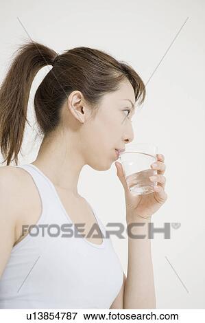 Stock Photo - Woman who drinks water. Fotosearch