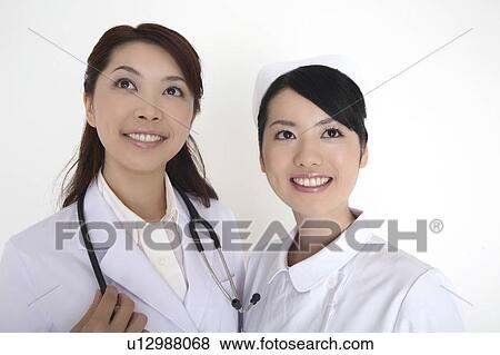 Stock Photo - Doctor and nurse. Fotosearch