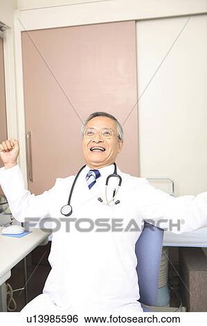 Stock Photograph - Doctor stretching itself. Fotosearch