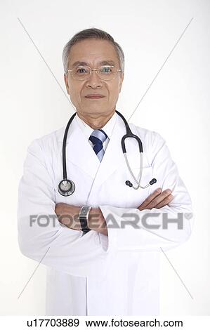 Stock Photo - Physician folding its arms. Fotosearch
