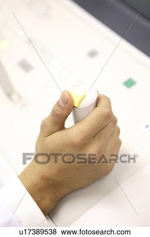 Stock Photo - Hand gripping a lever. Fotosearch