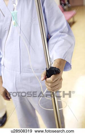 Hand with intravenous feeding View Large Photo Image Stock Photo - Hand with intravenous feeding. Fotosearch